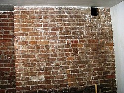 Painting, paint stripped off bricks